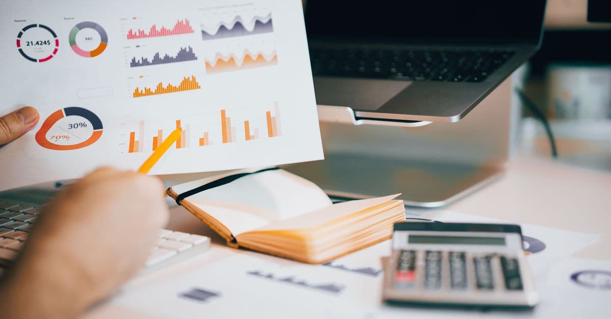 ASC 842 disclosure requirements: pencil over financial graphs