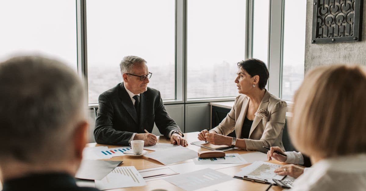 IFRS 16 post implementation review 2026: professionals in a boardroom