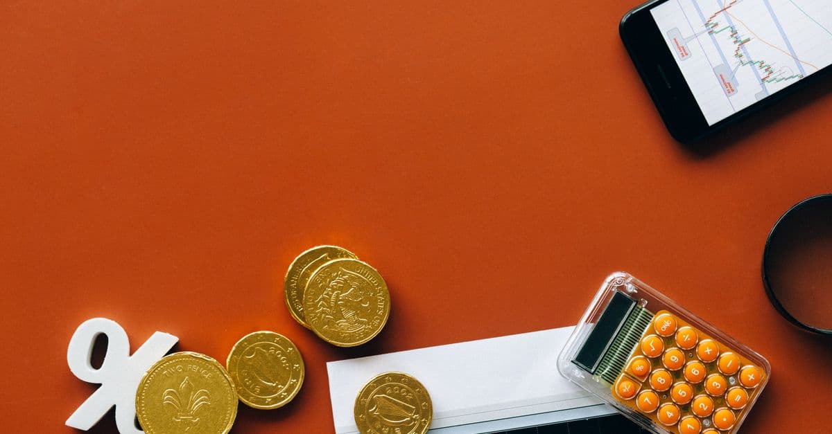 Incremental borrowing rate: coins and a financial interest-rate graph